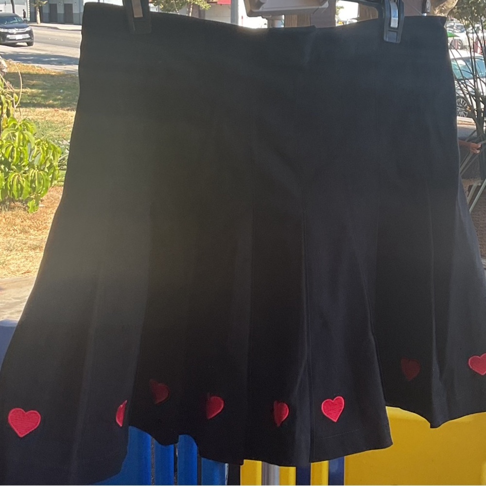 Tuesday of California black skirt with red hearts
